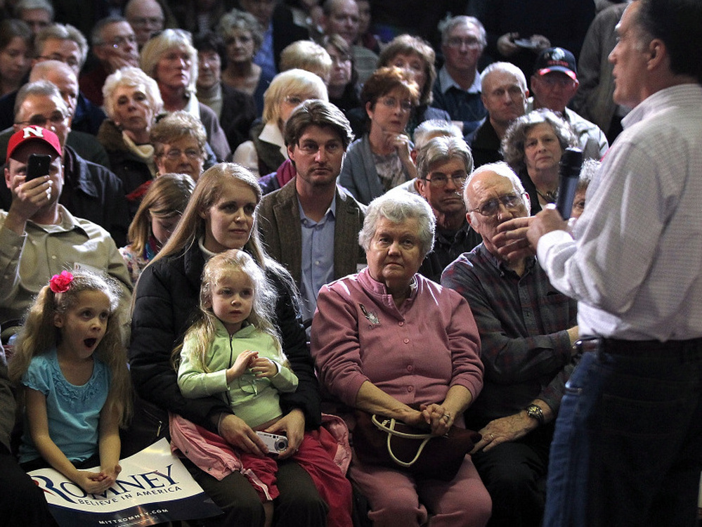 Former Massachusetts Gov. Mitt Romney campaigns Sunday in Council Bluffs, Iowa. 