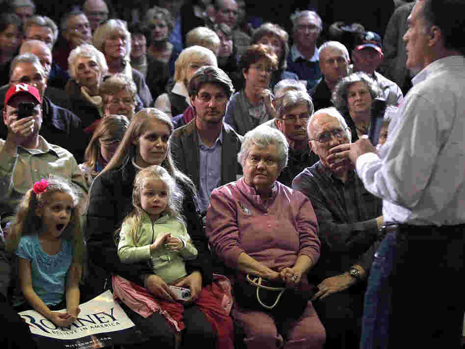Former Massachusetts Gov. Mitt Romney campaigns Sunday in Council Bluffs, Iowa. 