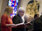 Newt Gingrich attends Catholic Mass at St. Ambrose Cathedral on Sunday in Des Moines, Iowa, with his wife, Callista, right. Newt Gingrich attends Catholic Mass at St. Ambrose Cathedral on Sunday in Des Moines, Iowa, with his wife, Callista, right.