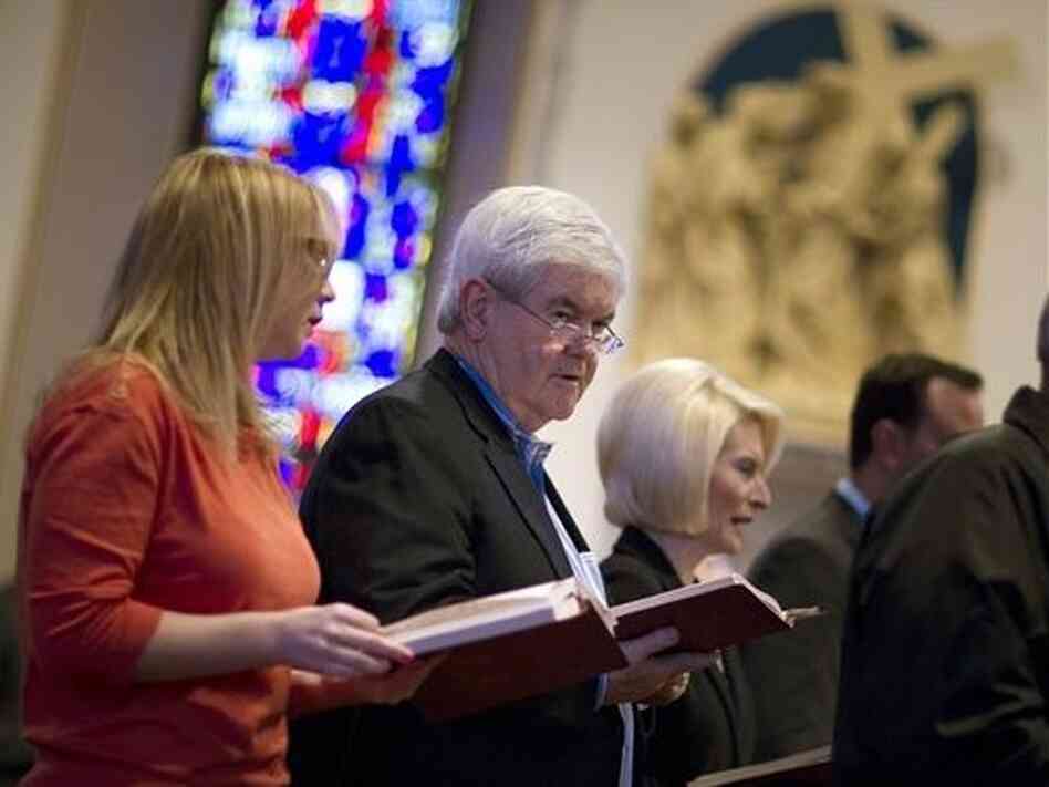 Newt Gingrich attends Catholic Mass at St. Ambrose Cathedral on Sunday in Des Moines, Iowa, with his wife, Callista, right. Newt Gingrich attends Catholic Mass at St. Ambrose Cathedral on Sunday in Des Moines, Iowa, with his wife, Callista, right.