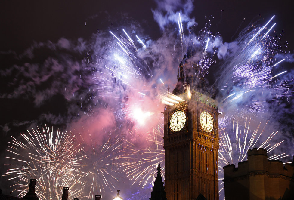 London celebrates the arrival of the new year with fireworks over the Houses of Parliament, including St. Stephen's Tower. 