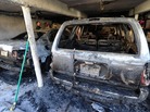 People inspect the damage following an overnight fire in Hollywood on Friday (Dec. 30, 2011). People inspect the damage following an overnight fire in Hollywood on Friday (Dec. 30, 2011).