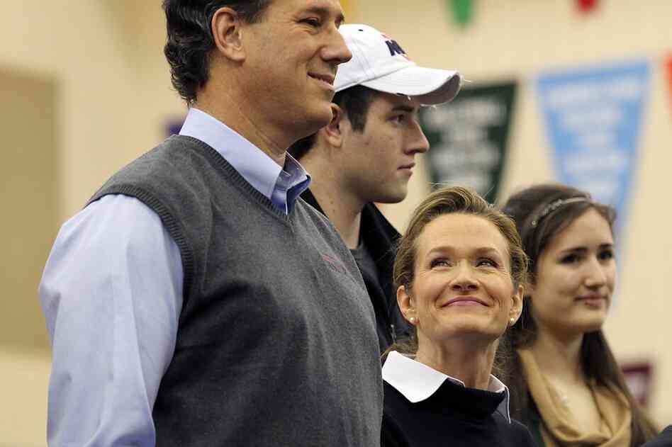 Karen Santorum looks up at her husband, Rick Santorum, during a "Rock the Caucus" event in West Des Moines. 