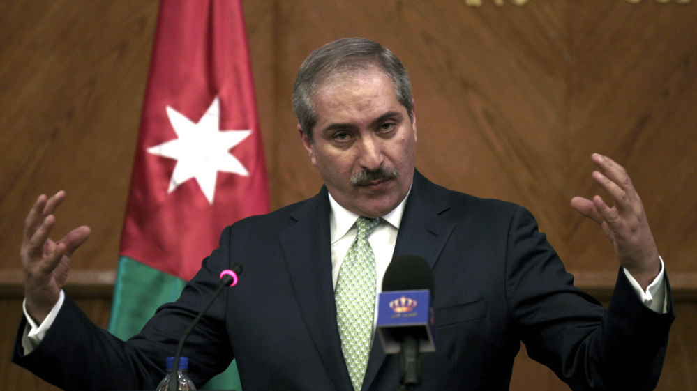 Jordanian Foreign Minister Nasser Judeh speaks during a press conference at the foreign ministry in Amman on Tuesday. Judeh said that Israeli and Palestinian negotiators held "positive" talks.