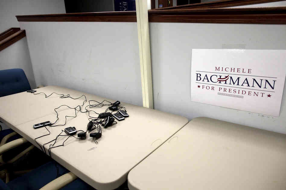 Scattered cellphones lay on a table at Bachmann's largely empty campaign headquarters.