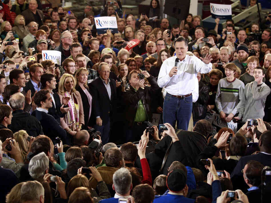 Former Massachusetts Gov. Mitt Romney speaks at a rally in Clive, Iowa, on Monday.