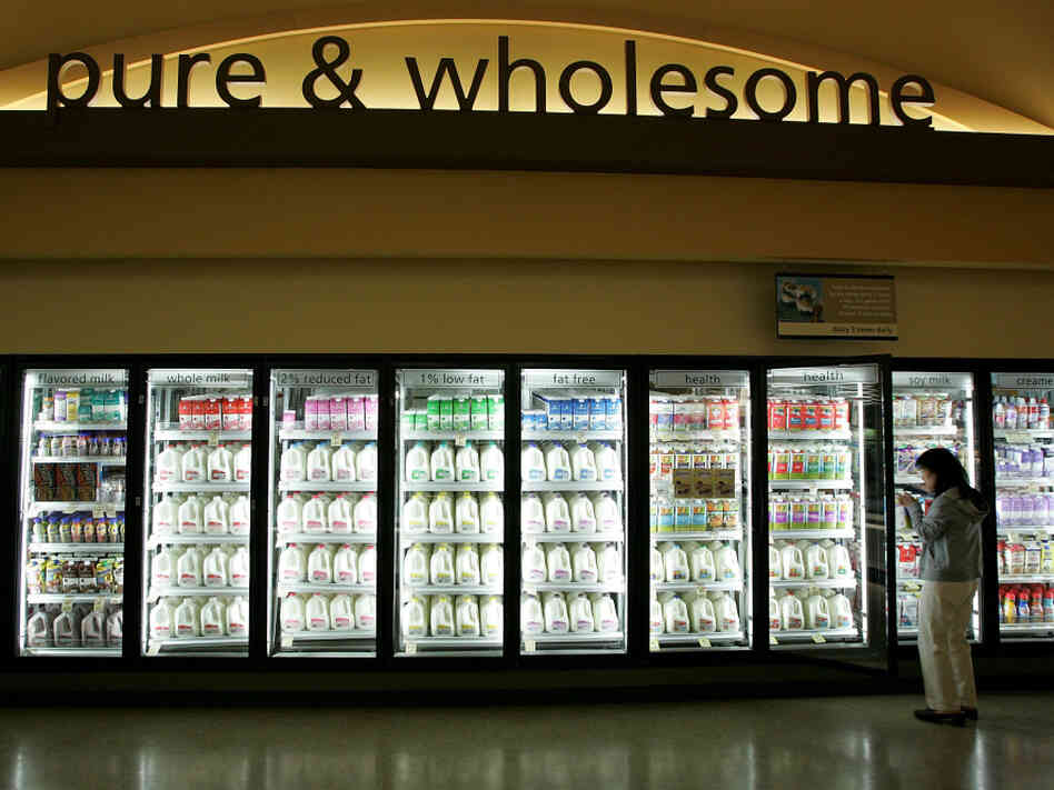 A Safeway customer shops for milk in Livermore, Calif. 