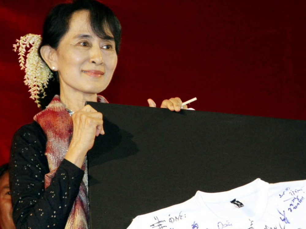 Myanmar has set parliamentary by-elections for April 1, scheduling a highly anticipated vote that will return dissident Aung San Suu Kyi and her National League for Democracy to mainstream politics after two decades. Here, Suu Kyi attends a fundraising event for the party in Yangon, Myanmar, last month.