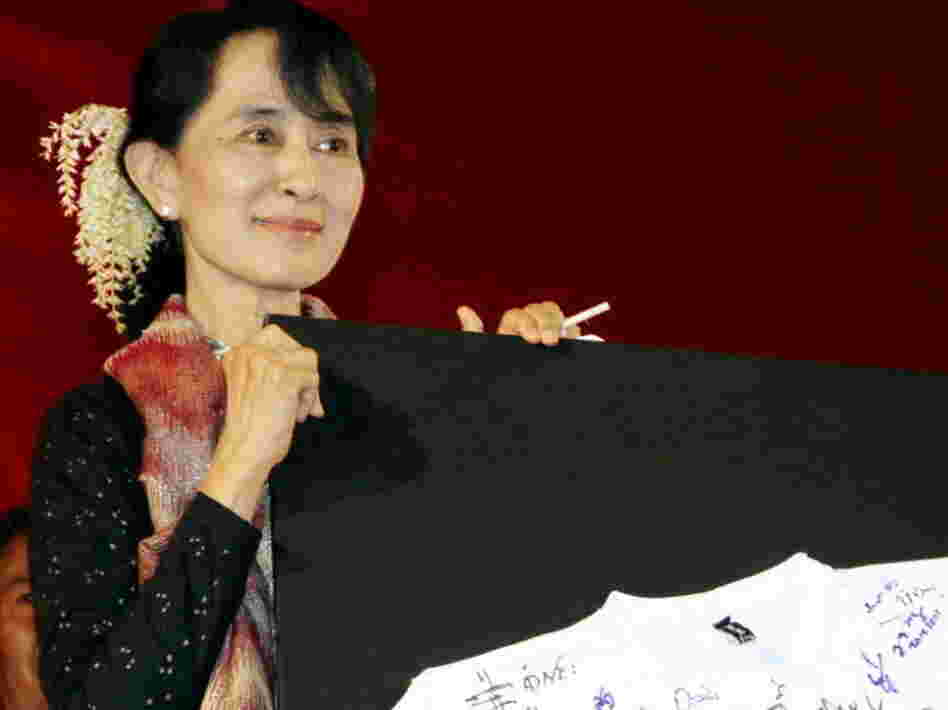 Myanmar has set parliamentary by-elections for April 1, scheduling a highly anticipated vote that will return dissident Aung San Suu Kyi and her National League for Democracy to mainstream politics after two decades. Here, Suu Kyi attends a fundraising event for the party in Yangon, Myanmar, last month.