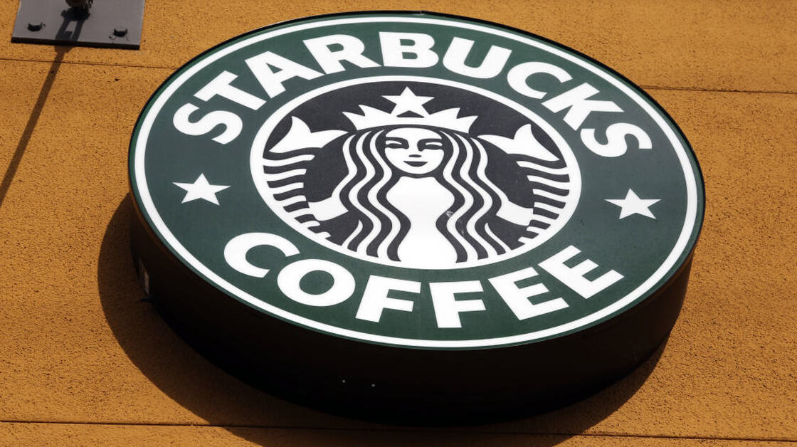 The exterior view of a Starbucks Coffee shop.