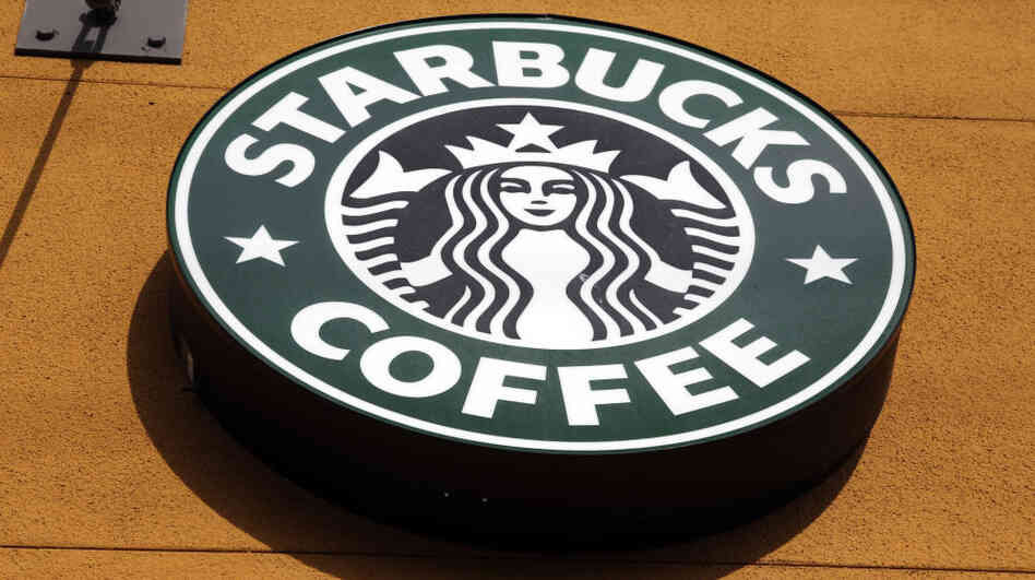 The exterior view of a Starbucks Coffee shop.