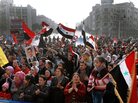Syria's embattled President Bashar Assad still has supporters, particularly among his fellow Alawites, a minority who believe they will suffer if Assad is ousted. Here, Assad supporters rally Tuesday in the capital, Damascus. Syria's embattled President Bashar Assad still has supporters, particularly among his fellow Alawites, a minority who believe they will suffer if Assad is ousted. Here, Assad supporters rally Tuesday in the capital, Damascus.