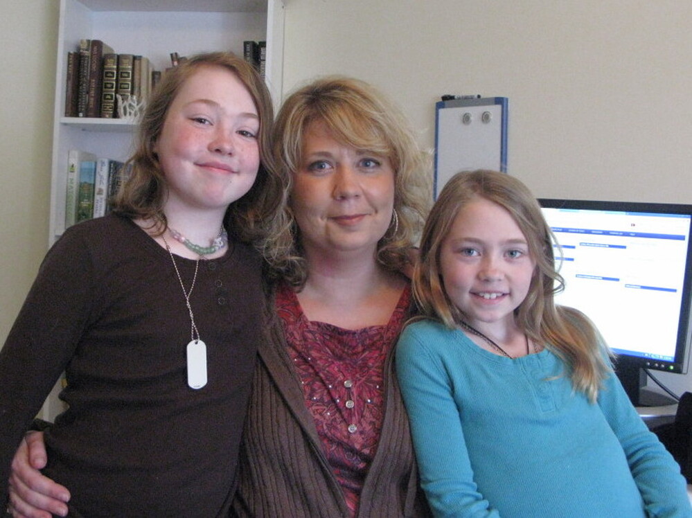 Sherrie Shackleford studies teaching at Western Governors University from her Indiana condo, where she lives with her daughters, Aubrey (left) and Alissa (right).