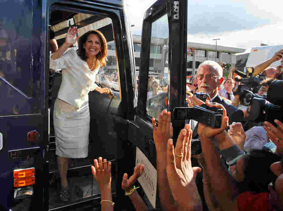 Republican presidential candidate Rep. Michele Bachmann steps from her campaign bus to greet supporters after winning the Iowa Republican Party's Straw Poll in Ames, Iowa, on Aug. 13. Republican presidential candidate Rep. Michele Bachmann steps from her campaign bus to greet supporters after winning the Iowa Republican Party's Straw Poll in Ames, Iowa, on Aug. 13.