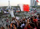 Bahrain is the one Arab country where the government has suppressed a major uprising. Here, protesters wave flags at the Pearl Roundabout in the capital Manama on Feb. 20, 2011, when the demonstrations were at their peak. Bahrain is the one Arab country where the government has suppressed a major uprising. Here, protesters wave flags at the Pearl Roundabout in the capital Manama on Feb. 20, 2011, when the demonstrations were at their peak.