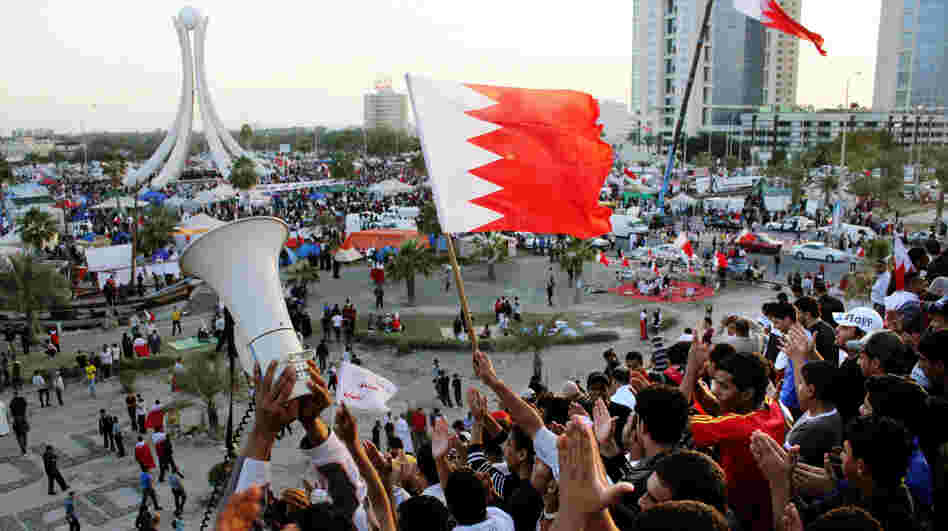 Bahrain is the one Arab country where the government has suppressed a major uprising. Here, protesters wave flags at the Pearl Roundabout in the capital Manama on Feb. 20, 2011, when the demonstrations were at their peak.