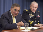 Defense Secretary Leon Panetta and Joint Chiefs Chairman Gen. Martin Dempsey take part in a news conference at the Pentagon in Washington in November 2011. The Obama administration is unveiling its new military strategy Thursday. Critics fear it could hamper the U.S. ability to fight two wars at once. Defense Secretary Leon Panetta and Joint Chiefs Chairman Gen. Martin Dempsey take part in a news conference at the Pentagon in Washington in November 2011. The Obama administration is unveiling its new military strategy Thursday. Critics fear it could hamper the U.S. ability to fight two wars at once.