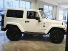 A Jeep Wrangler is seen at a dealership in Chicago. Powered by a newly designed fleet of vehicles, the brand saw a sharp rise in sales in 2011. A Jeep Wrangler is seen at a dealership in Chicago. Powered by a newly designed fleet of vehicles, the brand saw a sharp rise in sales in 2011.