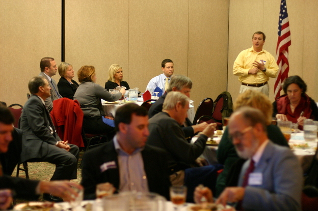 A surrogate makes the case for a GOP presidential candidate at a First Tuesday Republican Club lunch in Columbia, S.C., on Jan. 3.