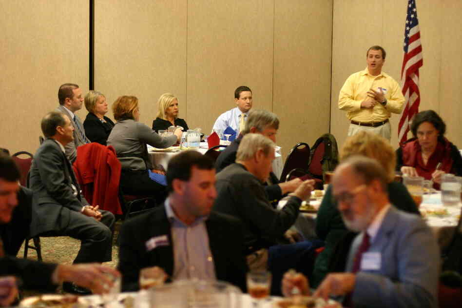 A surrogate makes the case for a GOP presidential candidate at a First Tuesday Republican Club lunch in Columbia, S.C., on Jan. 3.