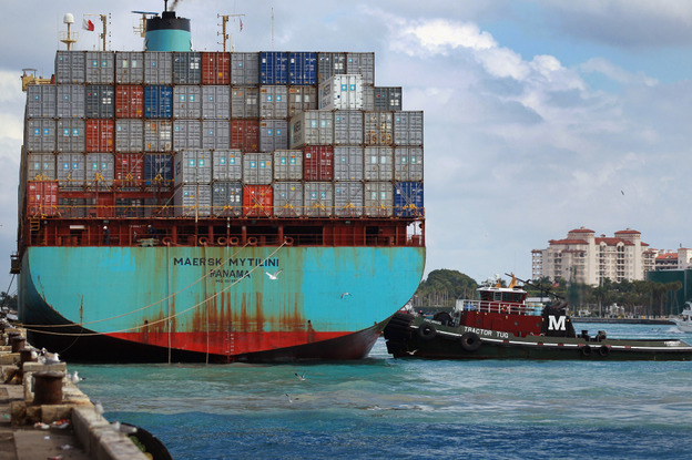 A container ship prepares to leave the Port of Miami in 2010. Plans are under way to deepen the port to 50 feet to attract bigger ships coming from the Panama Canal, but they've recently been put on hold after environmental groups filed a petition.