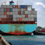 A container ship prepares to leave the Port of Miami in 2010. Plans are under way to deepen the port to 50 feet to attract bigger ships coming from the Panama Canal, but they've recently been put on hold after environmental groups filed a petition.