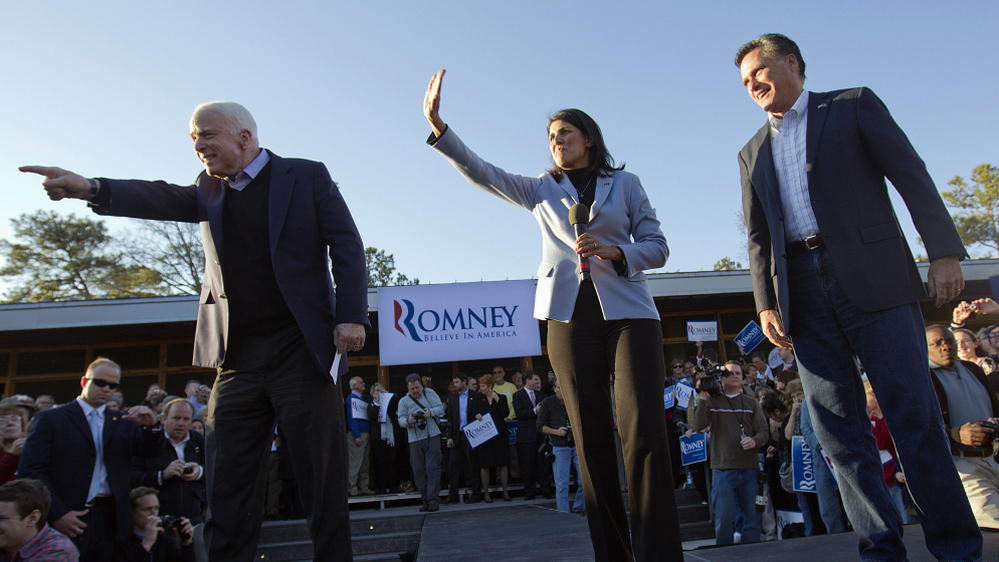 Mitt Romney, right, campaigns Thursday in South Carolina with South Carolina Gov. Nikki Haley, center, and Sen. John McCain, R-Ariz.