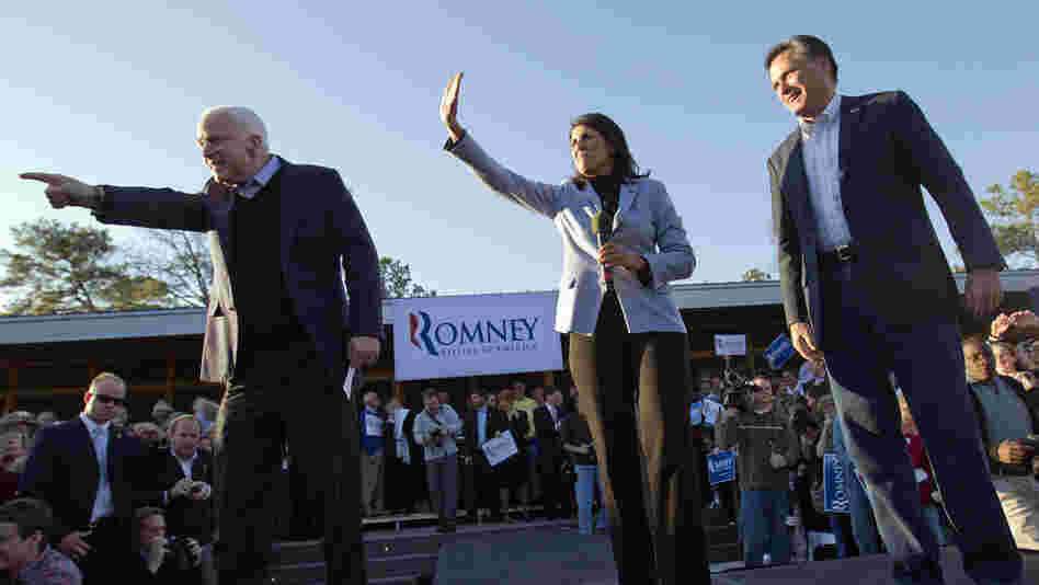 Mitt Romney, right, campaigns Thursday in South Carolina with South Carolina Gov. Nikki Haley, center, and Sen. John McCain, R-Ariz.