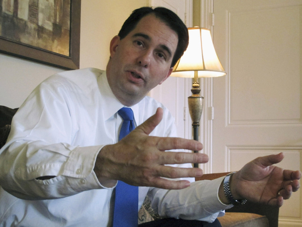 Wisconsin Gov. Scott Walker, seen here in Maple Bluff, Wis. in December, expects opponents to force a recall election against him. 