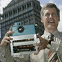 Kodak's Steven J. Sasson holds the world's first digital camera, which he built in 1975, at Kodak headquarters in Rochester, N.Y., in 2005. The company is now trying to sell about a thousand patents for digital photography to prevent bankruptcy.