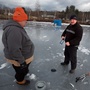 Dan Shaw of the Andover police department sets a line with friend Matt Snow of Belmont, N.H. Dan Shaw of the Andover police department sets a line with friend Matt Snow of Belmont, N.H.