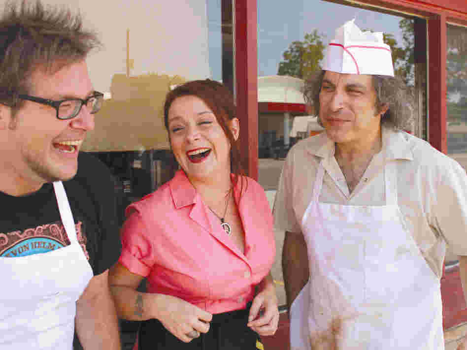 Carolyn Wonderland (center) learned guitar after getting thrown out of school at 17. 