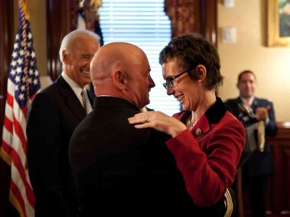 Captain Mark Kelly hugs his wife, Congresswoman Gabrielle Giffords at the White House in October.