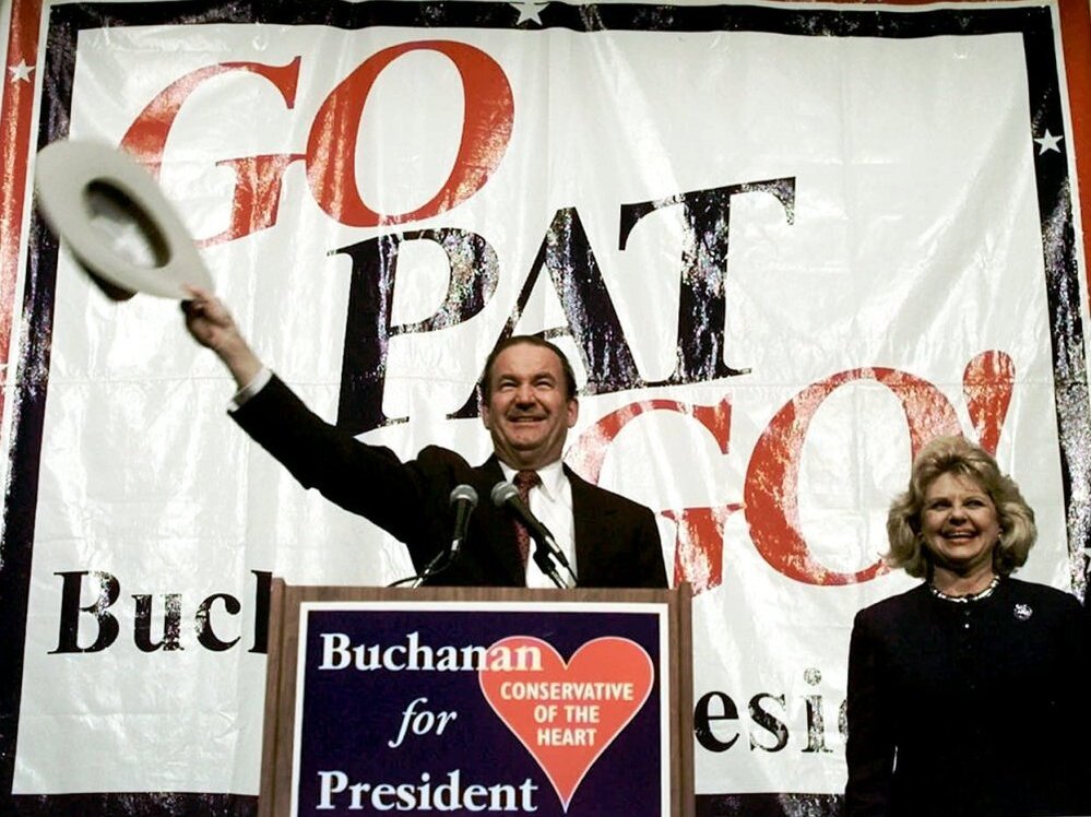 Pat Buchanan and wife Shelley acknowledge the crowd at a rally on March 6, 1996. Buchanan won the New Hampshire primary but lost the GOP nomination to Bob Dole.