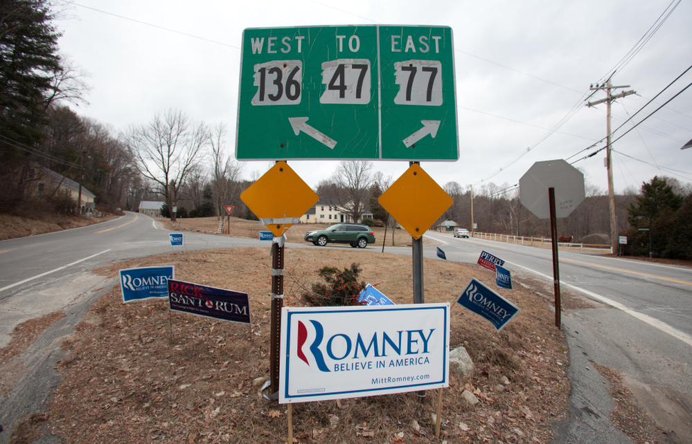 Political signs are pictured at an intersection in Manchester, New Hampshire. 