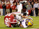 Not Giving An Inch: You can expect to see lots of close contact in Monday's BCS national title game. Here, Eric Reid of the LSU Tigers defends against Michael Williams of the Alabama Crimson Tide. Not Giving An Inch: You can expect to see lots of close contact in Monday's BCS national title game. Here, Eric Reid of the LSU Tigers defends against Michael Williams of the Alabama Crimson Tide.