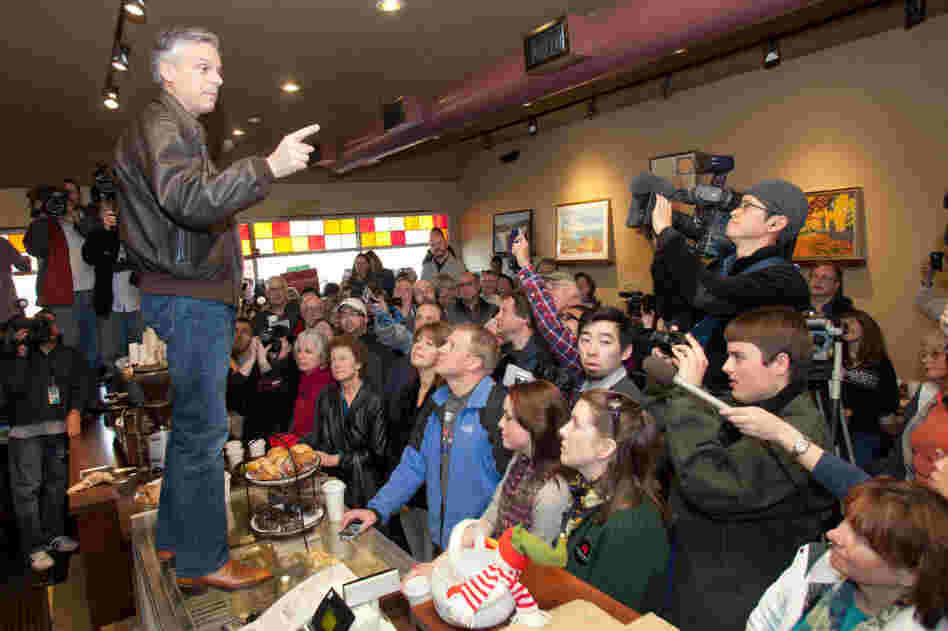 Republican presidential candidate Jon Huntsman campaigns from the counter at the Bean Towne Coffee House & Cafe in Hampstead, N.H., on Jan. 8. Polls show Huntsman gaining on front-runner Mitt Romney ahead of Tuesday's primary. Republican presidential candidate Jon Huntsman campaigns from the counter at the Bean Towne Coffee House & Cafe in Hampstead, N.H., on Jan. 8. Polls show Huntsman gaining on front-runner Mitt Romney ahead of Tuesday's primary.