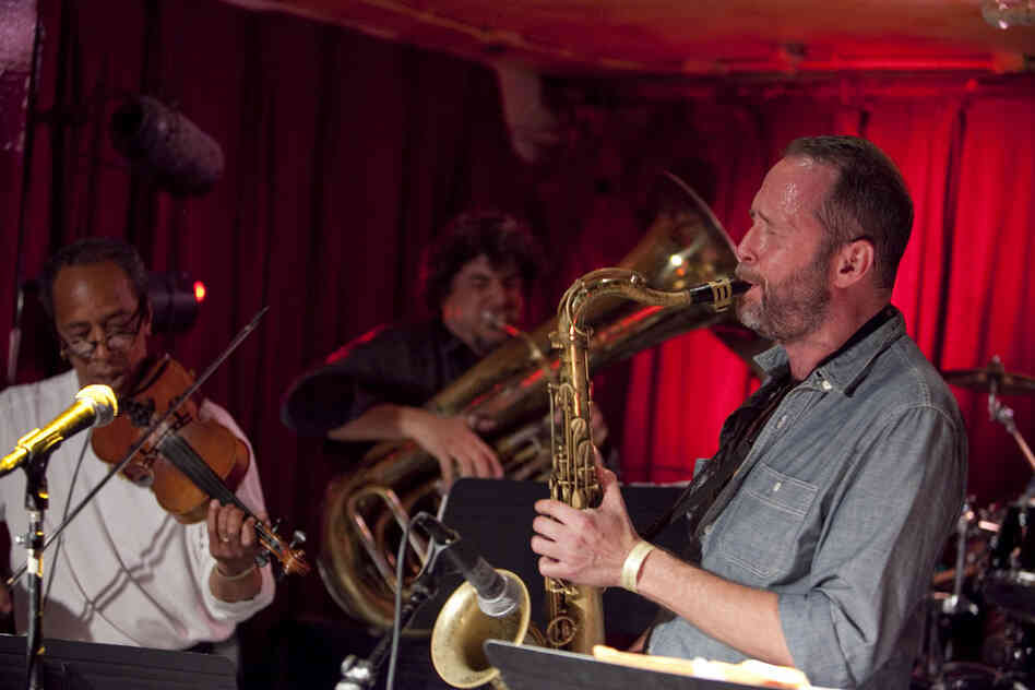 Michael Blake (right) performed with his band Hellbent, featuring Charlie Burnham on violin and Marcus Rojas on tuba.