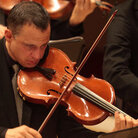 Strings perform Muse by Christopher Theofanidis during the second half of the Orpheus Chamber Orchestra The New Brandenburgs at the Spring for Music festival at Carnegie Hall in Manhattan, New York on May 06, 2011. Strings perform Muse by Christopher Theofanidis during the second half of the Orpheus Chamber Orchestra The New Brandenburgs at the Spring for Music festival at Carnegie Hall in Manhattan, New York on May 06, 2011.