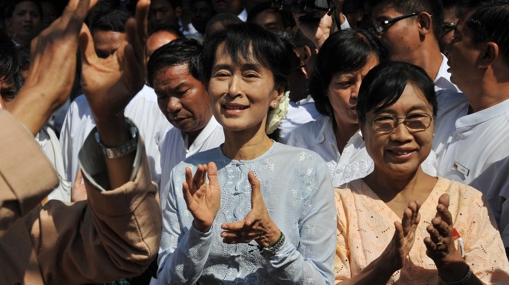 Myanmar democracy icon Aung San Suu Kyi, center, at an campaign event on Tuesday. 