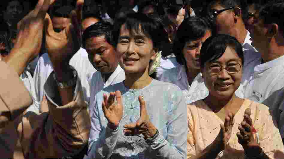Myanmar democracy icon Aung San Suu Kyi, center, at an campaign event on Tuesday. 