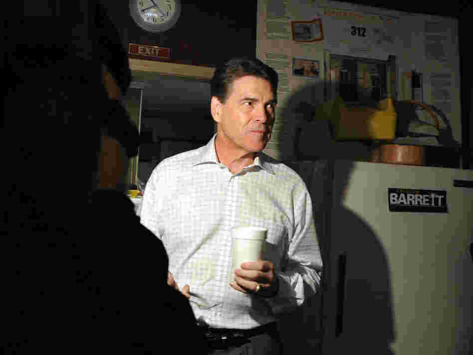 Texas Gov. Rick Perry campaigns in South Carolina on Jan. 9. Perry is suing Virginia to get his name on its March 6 primary ballot. 