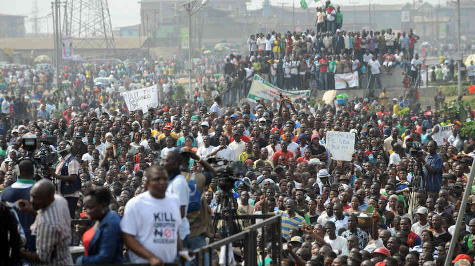 Protesters gather to protest against the end of gasoline subsidies in Lagos. Wednesday marked the third day of mass strikes by labor and civil society.