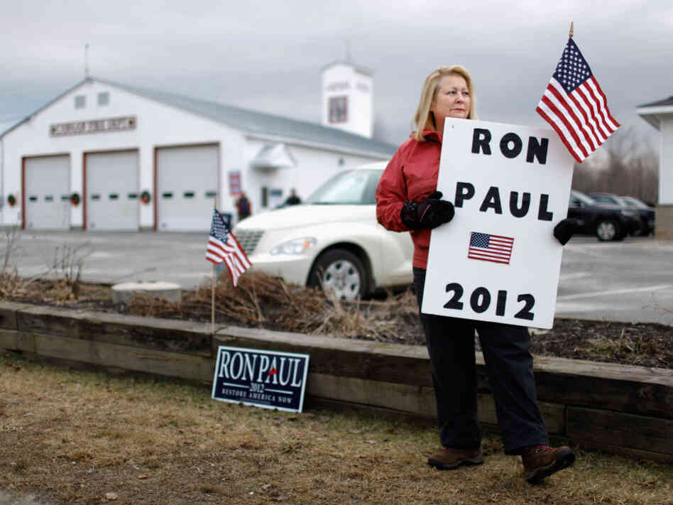 Susan Gayhart stations herself outside the polls at a fire station in Canaan, N.H., on the morning of the primary. Susan Gayhart stations herself outside the polls at a fire station in Canaan, N.H., on the morning of the primary.