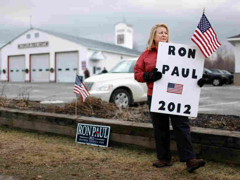 Susan Gayhart stations herself outside the polls at a fire station in Canaan, N.H., on the morning of the primary. Susan Gayhart stations herself outside the polls at a fire station in Canaan, N.H., on the morning of the primary.