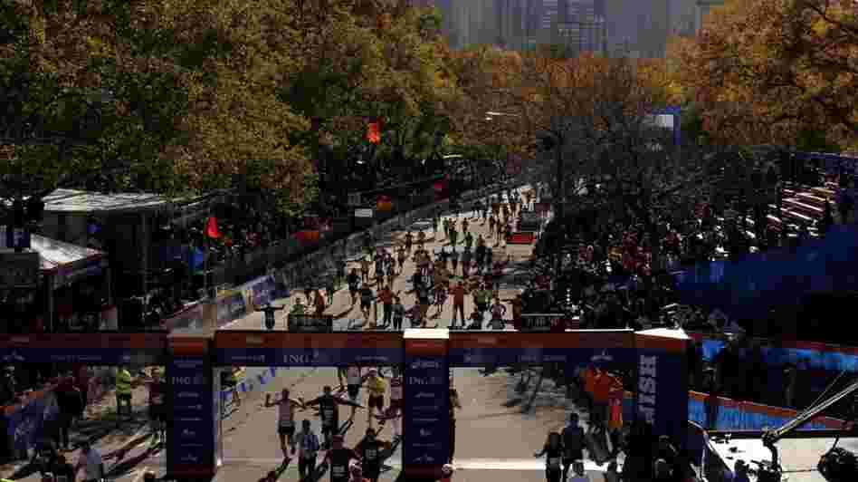 Runners approach the finish line of the New York City Marathon on Sunday, Nov. 6, 2011. 