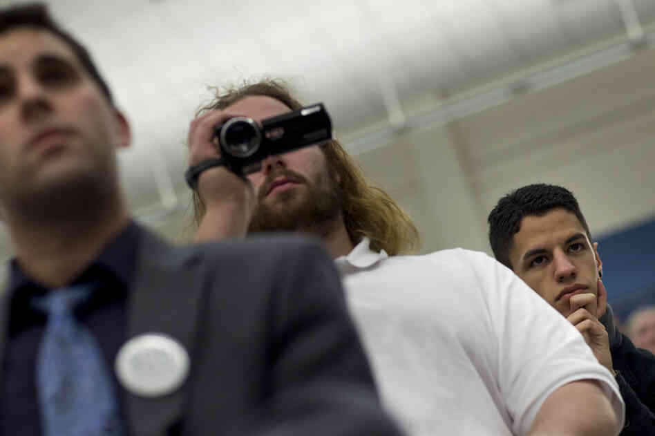 Young voters at the University of New Hampshire listen to Rep. Ron Paul on Friday, Jan. 6, 2012.