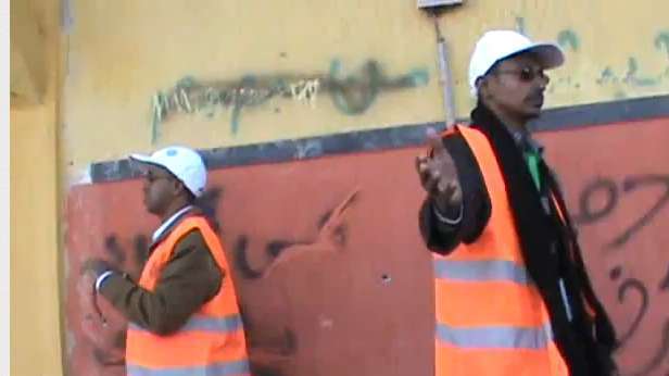 In this frame grab from an amatuer video posted on YouTube, members of the Arab League monitor the recent violence in Syria.