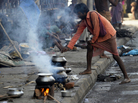 An Indian street dweller prepares food on the streets of Kolkata. A growing number of scientists say that reducing black carbon — mostly soot from burning wood, charcoal and dung — would have an immediate and powerful impact on climate. An Indian street dweller prepares food on the streets of Kolkata. A growing number of scientists say that reducing black carbon — mostly soot from burning wood, charcoal and dung — would have an immediate and powerful impact on climate.