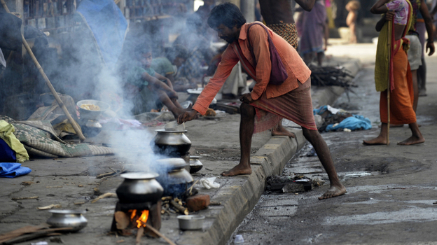 An Indian street dweller prepares food on the streets of Kolkata. A growing number of scientists say that reducing black carbon - mostly soot from burning wood, charcoal and dung - would have an immediate and powerful impact on climate. An Indian street dweller prepares food on the streets of Kolkata. A growing number of scientists say that reducing black carbon - mostly soot from burning wood, charcoal and dung - would have an immediate and powerful impact on climate.